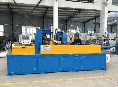 Computerized coiling and packing machine