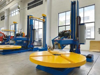 Flat disc coiling machine